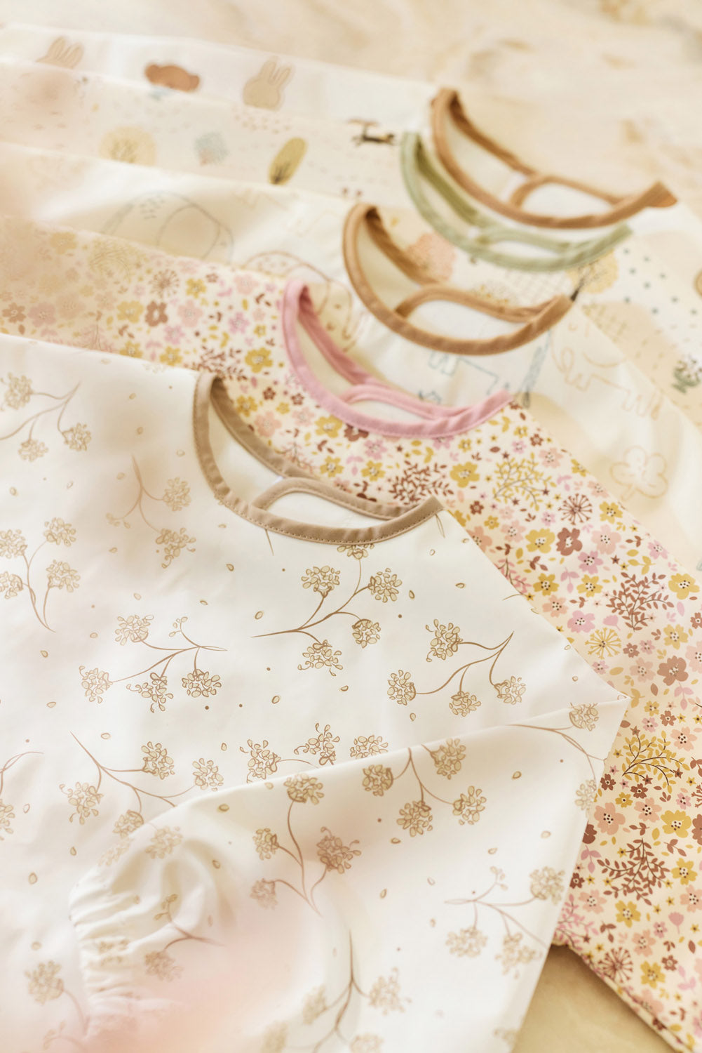 Babero impermeable Flower Fairies Jollein