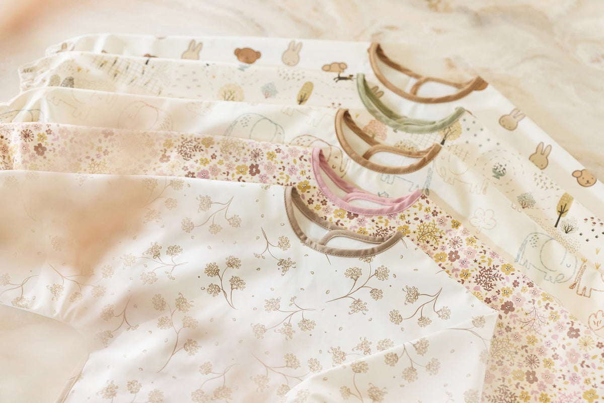 Babero impermeable Flower Fairies Jollein